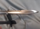 Swiss bayonet, 1914 type. Metal scabbard, leather hanger.