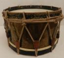 Old drum, teared leather on one side, sold with leather baldric