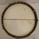 Old drum, teared leather on one side, sold with leather baldric