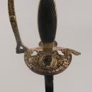 Sword with Napoleon face, pommel with helmet.