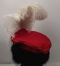 Toque bordered with fur, with heckle of ostrich feathers