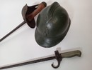 Relics WW I.  Sabre GB,  Adrian helmet, french bayonet 