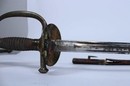 Sword for junior officer, 1857 type, eagle with half opened wings, scabbard in 2 pieces.