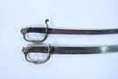 2 sabres 1821 type, no scabbard.