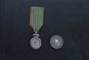 Medal of Saint Helena (silverplated) and medal of Crimea 