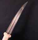 Dagger with camel bone handle and damascus blade, scabbard covered with velvet. Handicraft production. 