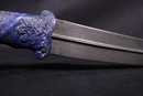 Dagger with blue stone handle and wootz blade. Handicraft production. 