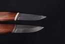 Scandinavian knife with damascus blade, wood handle and leather scabbard.