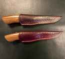 Scandinavian knife with damascus or wootz blade, wood handle and leather scabbard.