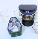 Shako/lamp containing a figurine of Napoleon + (empty) box for traditional corsican cookies.