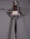 Rapier decorated with musketeers, unsuitable for fencing.
