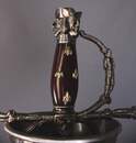 Rapier decorated with musketeers, unsuitable for fencing.