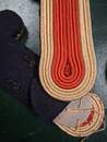 Cloverleaf epaulettes - Red center, gold sides. New old stock to finish. Produced by Ets David before 1960. The pair 