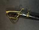 Light cavalry officer's saber, Empire. Blade engraved with a crowned eagle. Scabbard with brass fittings. 