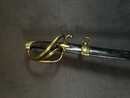 Light cavalry officer's saber, Empire. Blade engraved with a crowned eagle. Scabbard with brass fittings. 