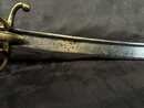 Light cavalry officer's saber, Empire. Blade engraved with a crowned eagle. Scabbard with brass fittings. 