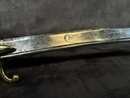 Light cavalry officer's saber, Empire. Blade engraved with a crowned eagle. Scabbard with brass fittings. 
