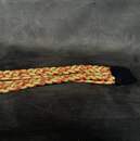 Gold and red aiguillettes without metal tips. Manufactured prior to 1960. New old stock.