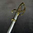 Light cavalry officer's saber, Empire/restoration. Blade engraved with blue and gold decoration. Scabbard with brass fittings.