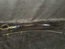 Light cavalry officer's saber, Empire/restoration. Blade engraved with blue and gold decoration. Scabbard with brass fittings.