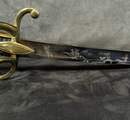 Light cavalry officer's saber, Empire/restoration. Blade engraved with blue and gold decoration. Scabbard with brass fittings.