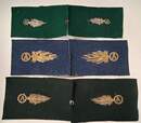 Pair of collar badges for a motor vehicle driver. Embroidered grenades with the letter 
