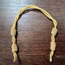 Gold-colored NON sliding chin straps for caps. New old stock. Price per unit 