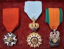 Presentation case containing the three Napoleonic orders: Legion of Honour, Order of the Reunion, and Order of the Iron Crown. Only one set available.