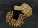 Pre-owned Major General's epaulettes (convertible to Brigadier General... or even Colonel); new condition, but with traces of glue.