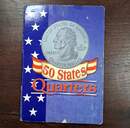 Set comprising an album of 49 U.S. state quarters plus 2  coin specimens.