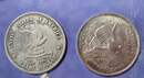 Set comprising an album of 49 U.S. state quarters plus 2  coin specimens.