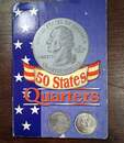 Set comprising an album of 49 U.S. state quarters plus 2  coin specimens.