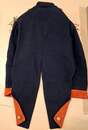 Child's naval officer's uniform, made around 1900, in an antique box.
