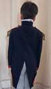 Child's naval officer's uniform, made around 1900, in an antique box.