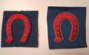 WWI. Embroidered red iron-style badge with gold/blues. 