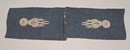 Pair of 60 mm white wool grenade patches on horizon-blue backing, new old stock. Only one pair in stock.