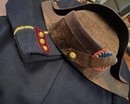 Uniform of a medical officer cadet. Including jacket, red breeches, belt, AND BICORN
