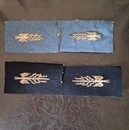 WWI. Pair of officer's General Staff lightning bolt insignia, silver-embroidered, 70 mm, on a wool cloth backing.