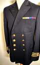 Set of 2 British Merchant Navy officer's uniforms, including a ceremonial Spencer jacket, 