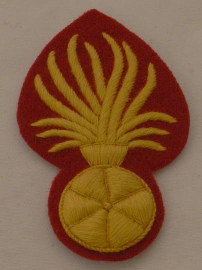 Lip grenades 13 flames, hand-embroidered in purl on a woollen background. Price per piece