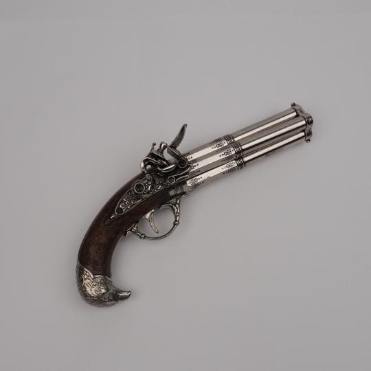 EmpireCostume - Pistolet 4 canons acier - Pommeau tête d'aigle