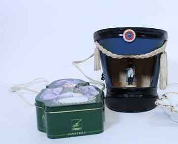 Shako/lamp containing a figurine of Napoleon + (empty) box for traditional corsican cookies.