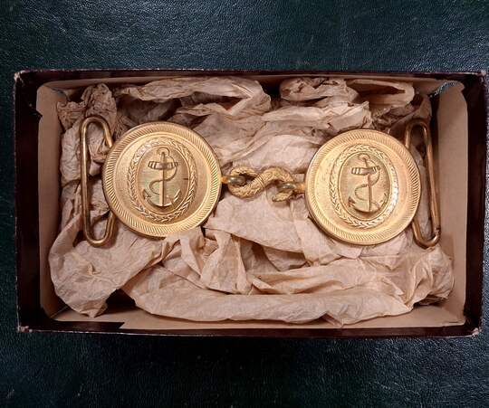 Naval officer's gilt belt buckles, in a fine antique box.