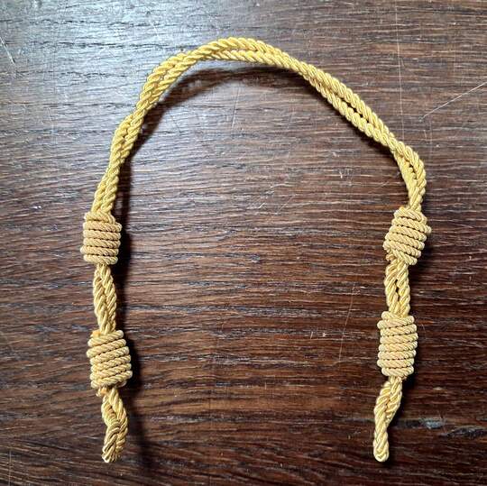Gold-colored NON sliding chin straps for caps. New old stock. Price per unit 
