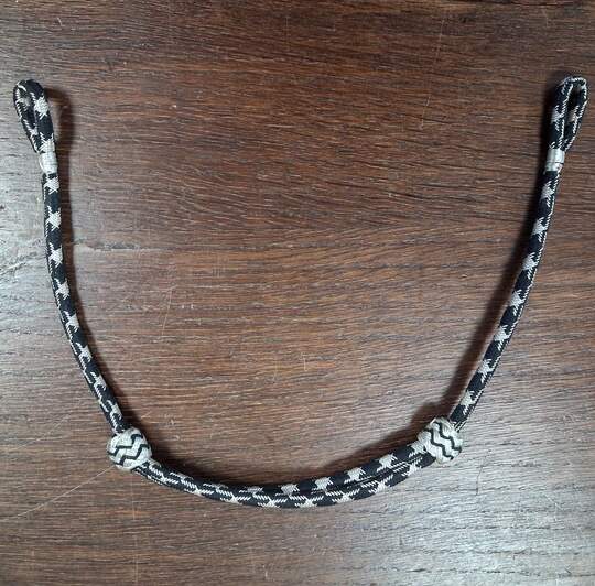 Sliding chin straps, black/silver. New old stock. Price per unit. WWII German?