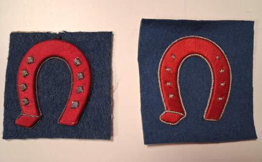 WWI. Embroidered red iron-style badge with gold/blues. 