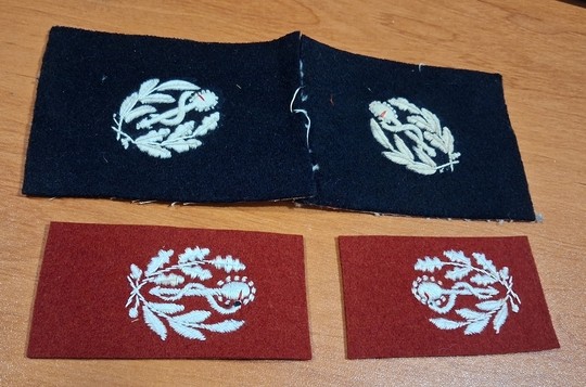 WWI. Pair of collar patches featuring a white caduceus on a black or madder-red background; new old stock.