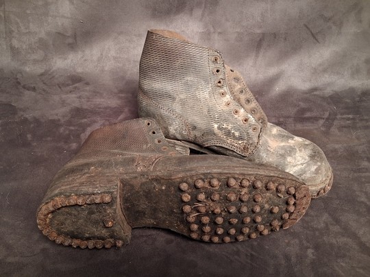 WWI. Civilian-issue ankle boots, not exactly new.