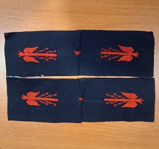WWI. Pairs of General Staff lightning bolt insignia, embroidered in red on dark navy wool. Very limited stock.
