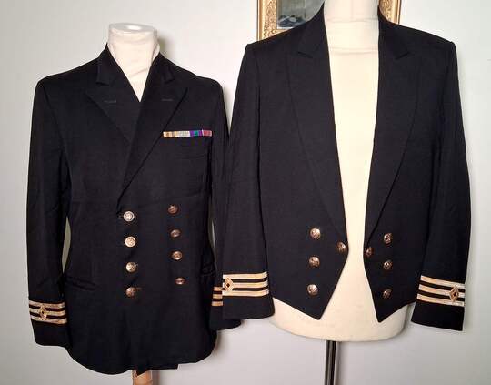 Set of 2 British Merchant Navy officer's uniforms, including a ceremonial Spencer jacket, 